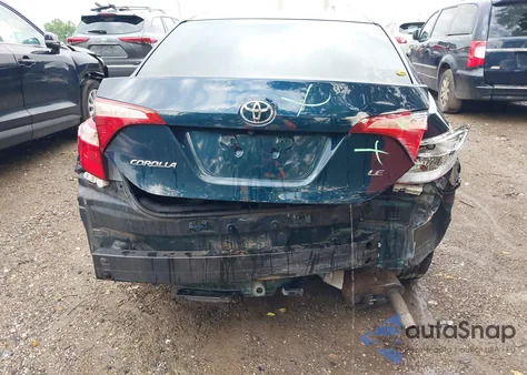 2017 Toyota Corolla Le z USA, uszkodzony, nr VIN 5YFBURHE0HP597542